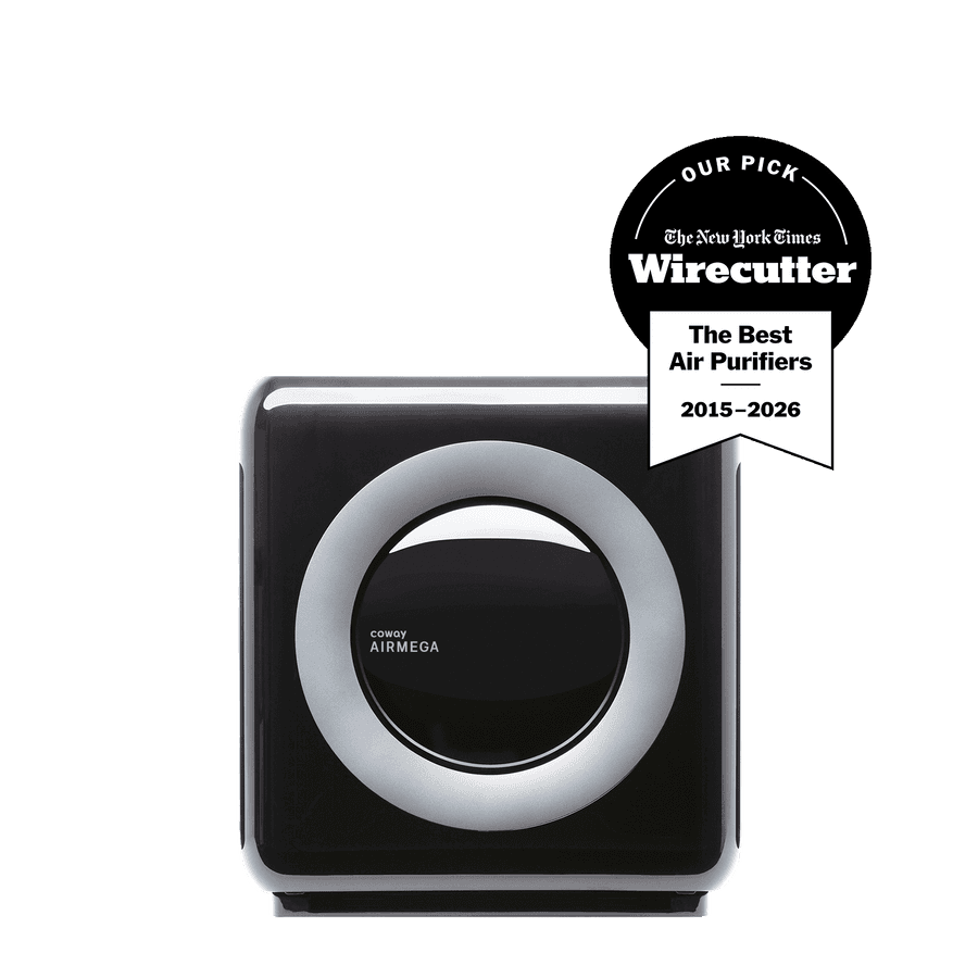 Coway Airmega AP-1512HH Mighty air purifier in black, front view, with the manufacturer's Wirecutter "Our Pick — The Best Air Purifiers 2015–2026" award badge in the corner